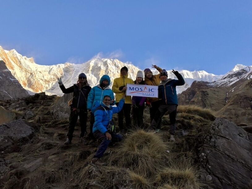 2025 ABC trek group hoto with himalayas on the background