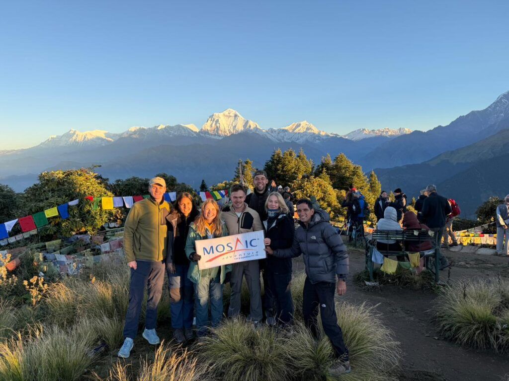 our group at the top of Poon hill to enjoy sunrise over himalayas