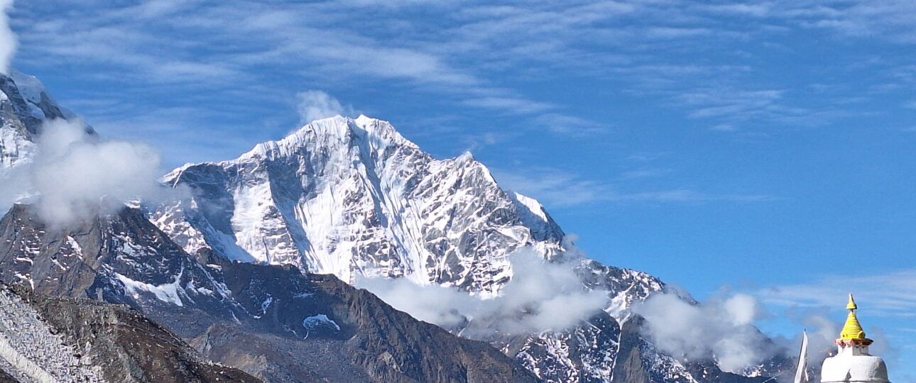 Dingboche Village with superb view of mountain and stupa protecting the village