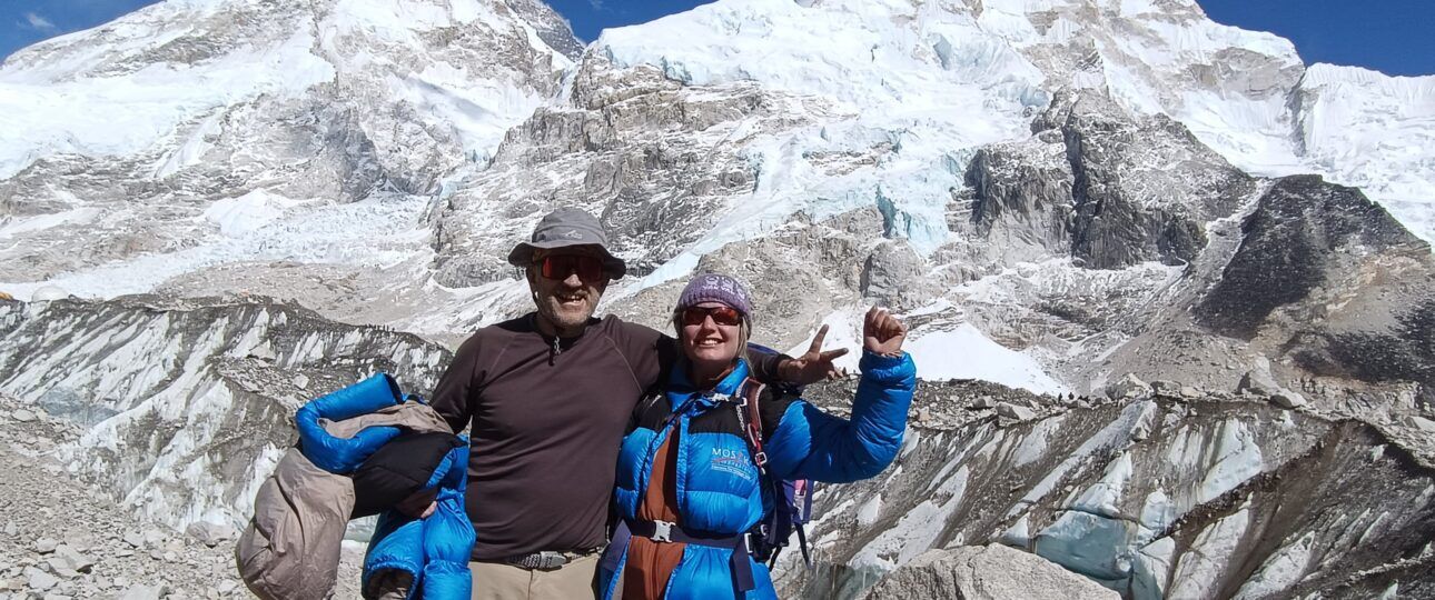 Achievement unlocked! Our clients celebrating at Everest Base Camp (5,364m) with the spectacular Khumbu Icefall in the background. After this monumental achievement, the helicopter awaits for the quick, scenic return to Kathmandu.