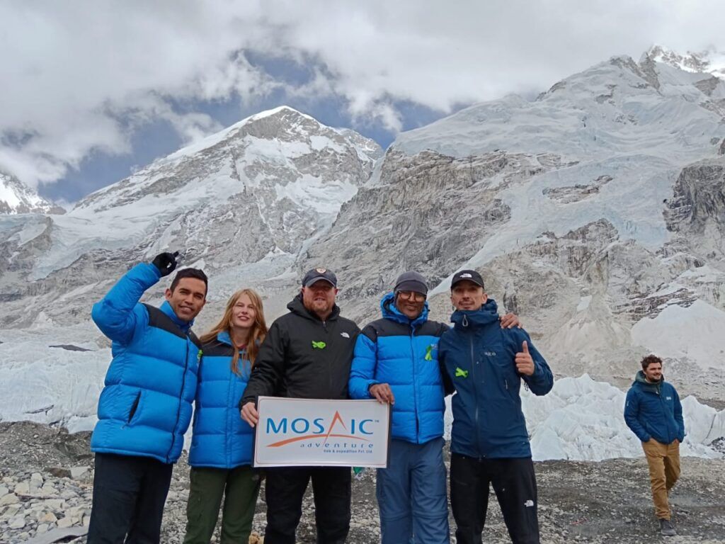 top of everest base camp with mosaic adventure led by experienced guide Madan Aryal